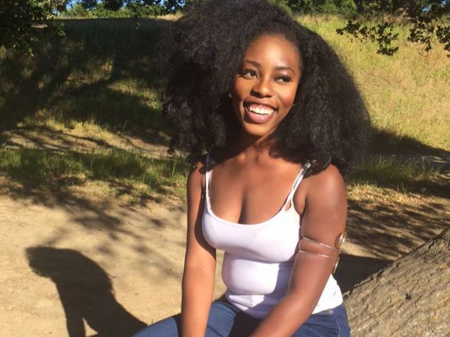 Ope smiling outdoors